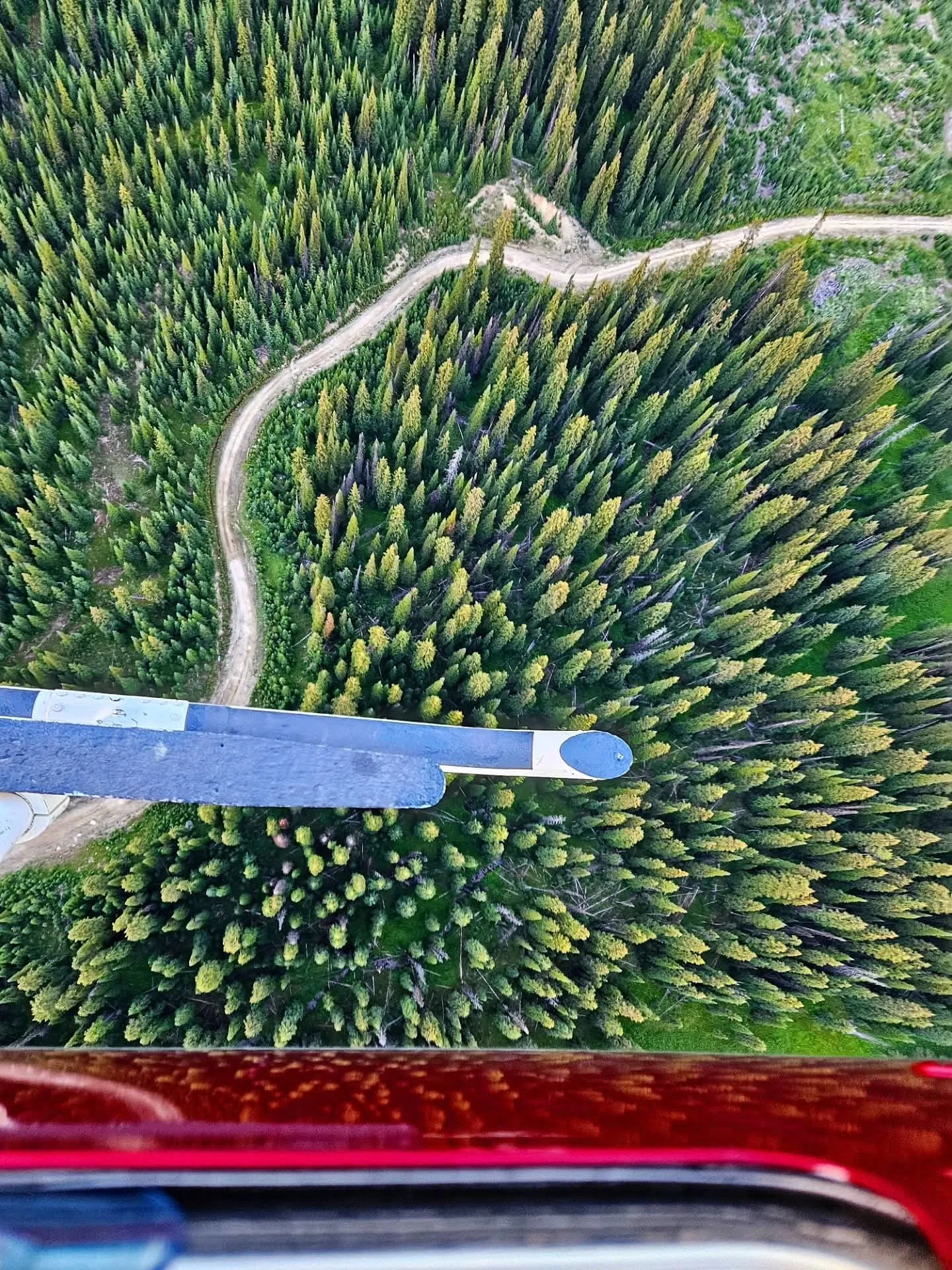 High Altitude Heli Services helicopter in flight over British Columbia